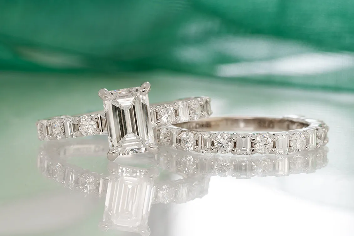 Emerald Cut Diamond Ring with Various Shaped Accents
